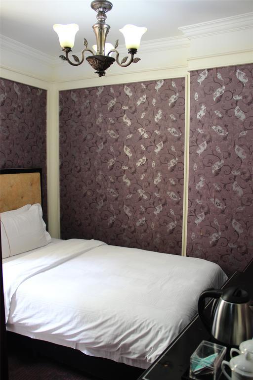 Manhattan Jinling Hotel Xangai Quarto foto