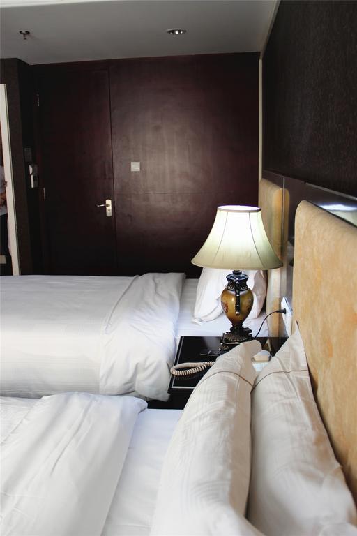 Manhattan Jinling Hotel Xangai Quarto foto
