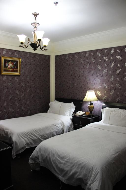 Manhattan Jinling Hotel Xangai Quarto foto