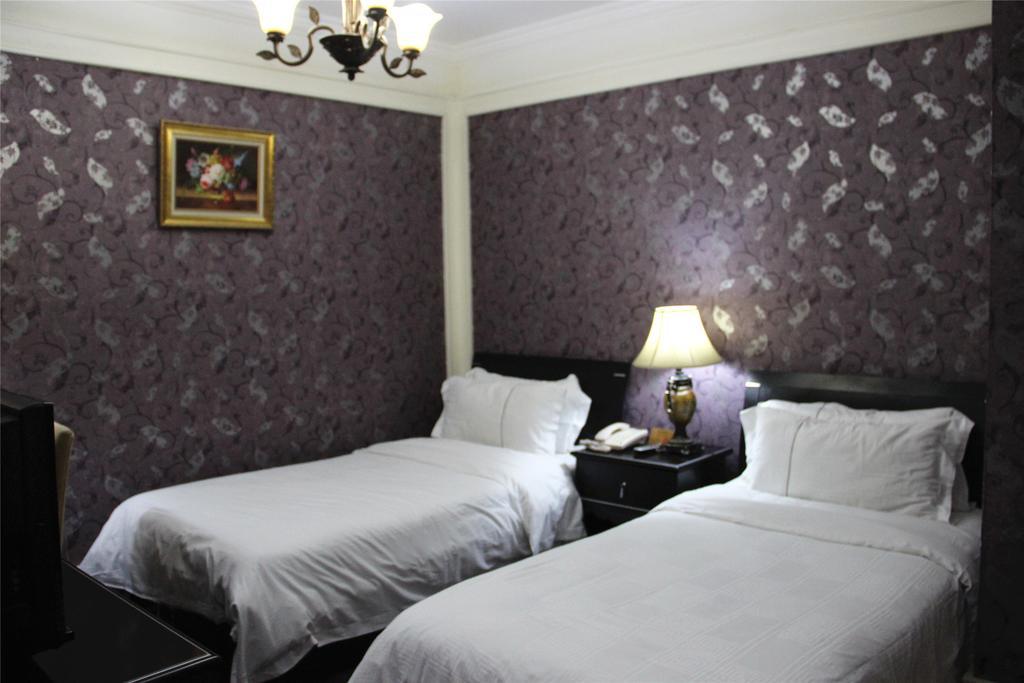 Manhattan Jinling Hotel Xangai Quarto foto