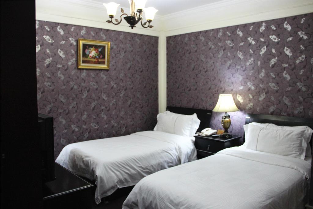 Manhattan Jinling Hotel Xangai Quarto foto